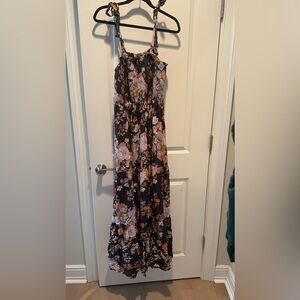 Great fall dress with adjustable straps! Never worn but not tags